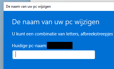 Screenshot of the Windows 11 computer
  name dialog. Metro design. Text field is white with rounded edges and
  no outline.